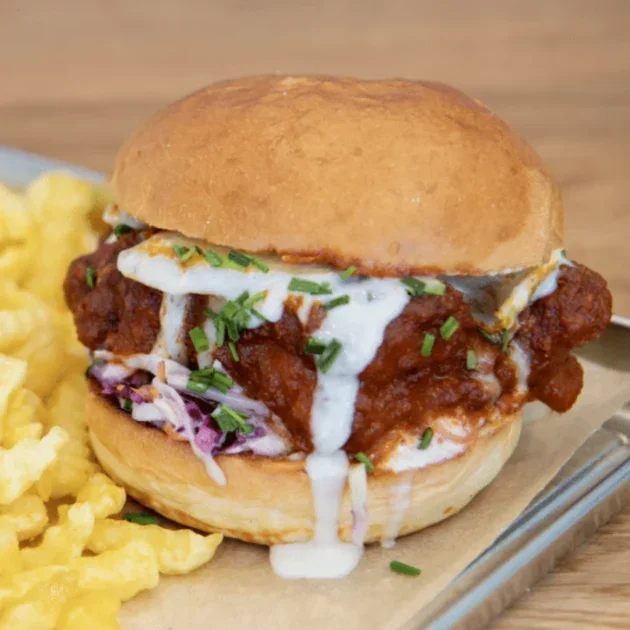 The Buffalo fried chicken burger with buffalo sauce, blue cheese, chives